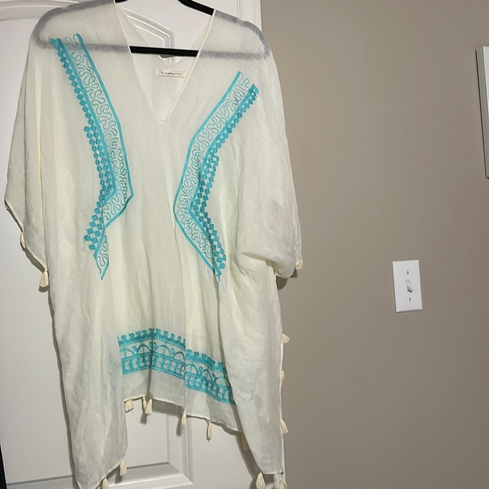 Off white swimsuit coverup with light blue embroidery